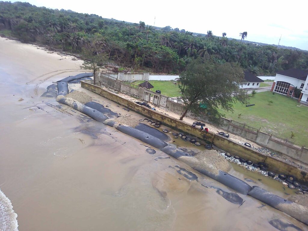 TITANTube® coastal revetment protecting beachfront property — West Africa